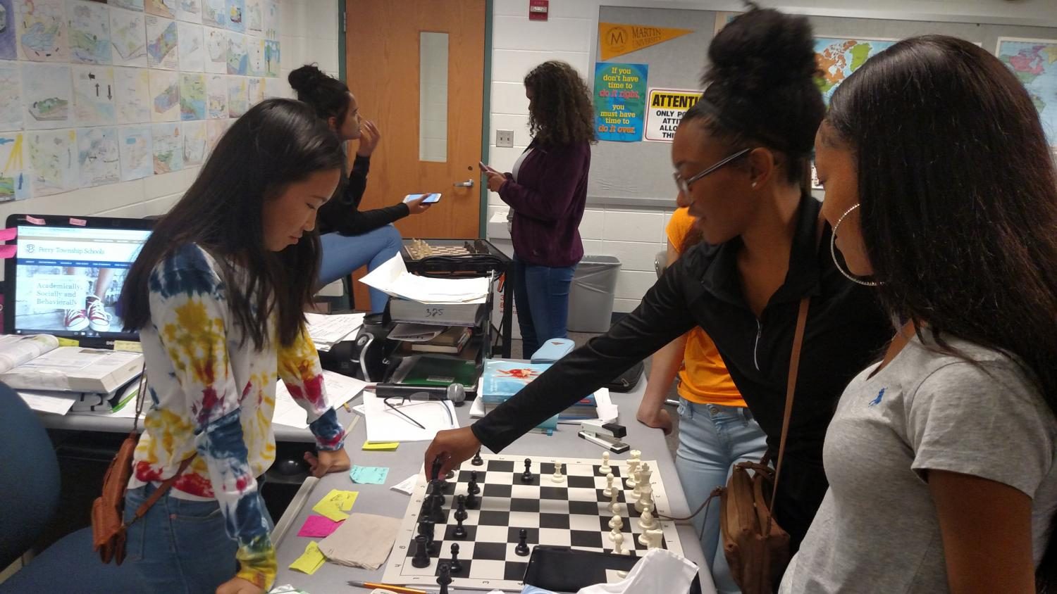 Lauren Houk and Kaleyah Kimbrough face off in an intense game of chess during their BLU63 class