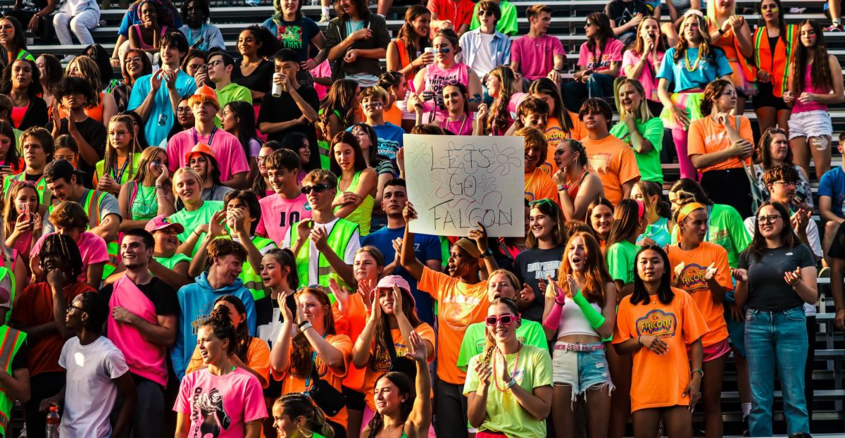 The student section roars in anticipation of the first home football game of the season against Franklin Central.