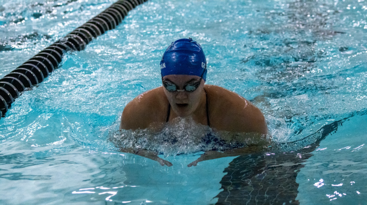 Gumiran swimming breast stroke during the Nov. 16 meet against Bishop Chatard at Perry.