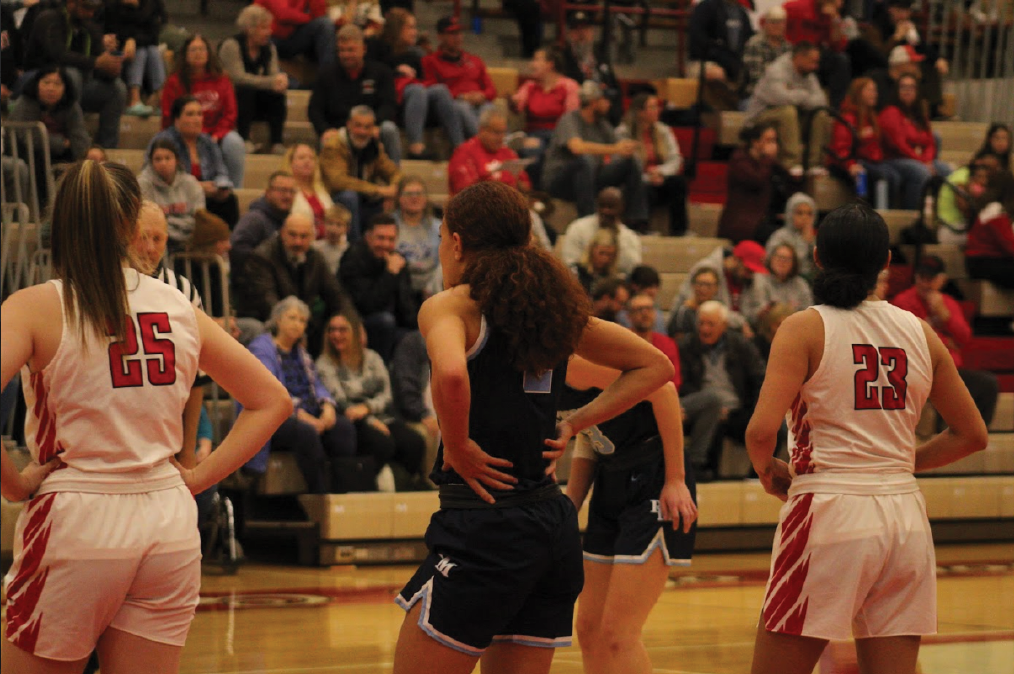 Lady+Falcons+take+on+the+Southport+Cardinals+in+a+packed+rivalry+game+at+the+historic+Southport+Fieldhouse.