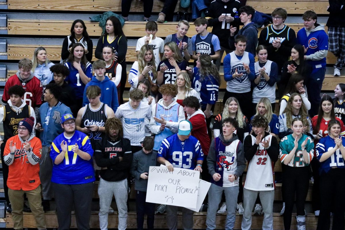 The PMHS student section cheers on the boys basketball team in their game against Martinsville on Jan. 19.