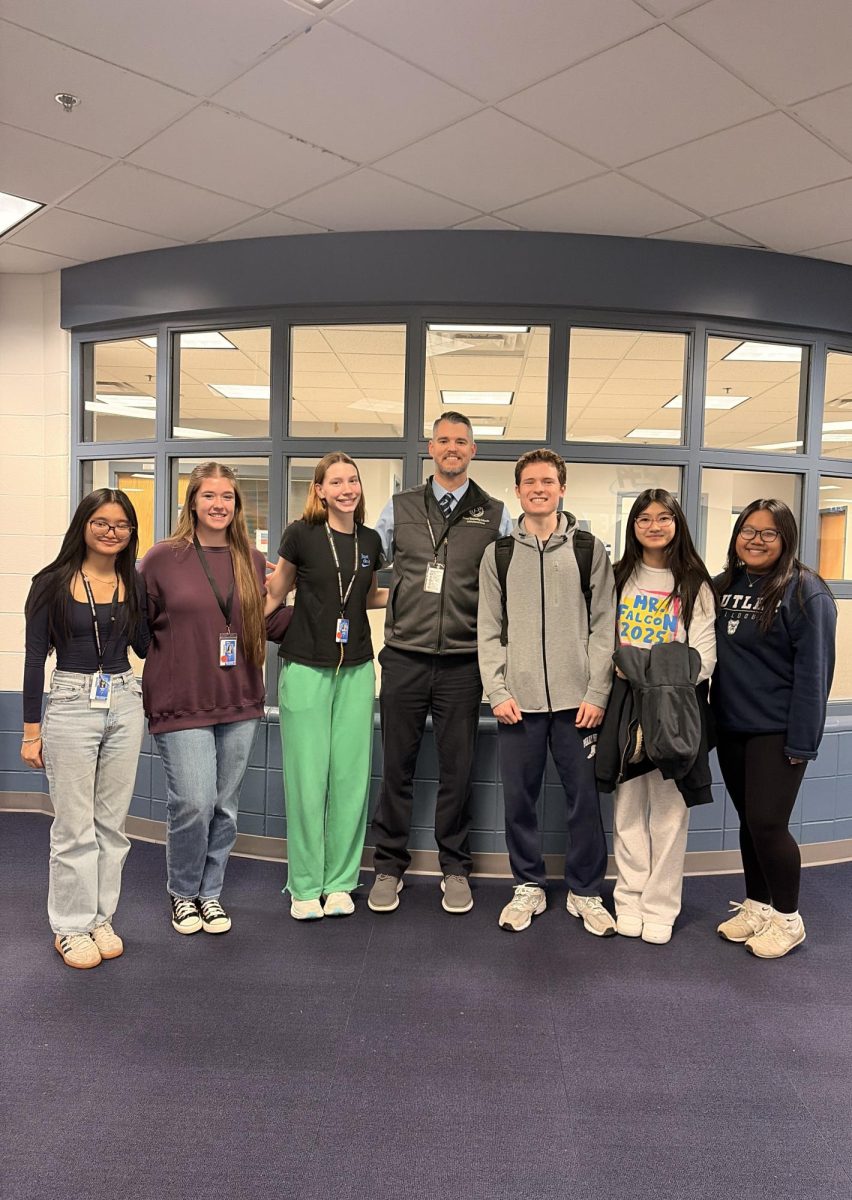 Students from the Senior class pose with Mr. Sinclair.